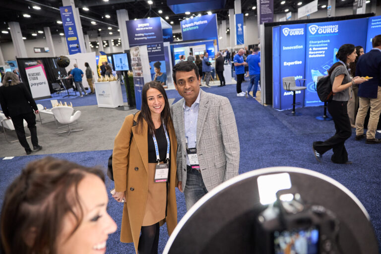Attendees taking a photo at TRANSACT