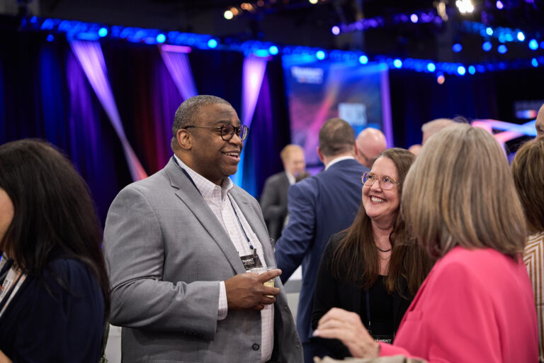 Attendees at an after-party at TRANSACT