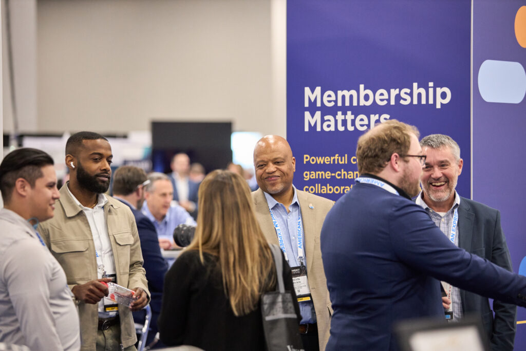 Attendees making a connection at TRANSACT