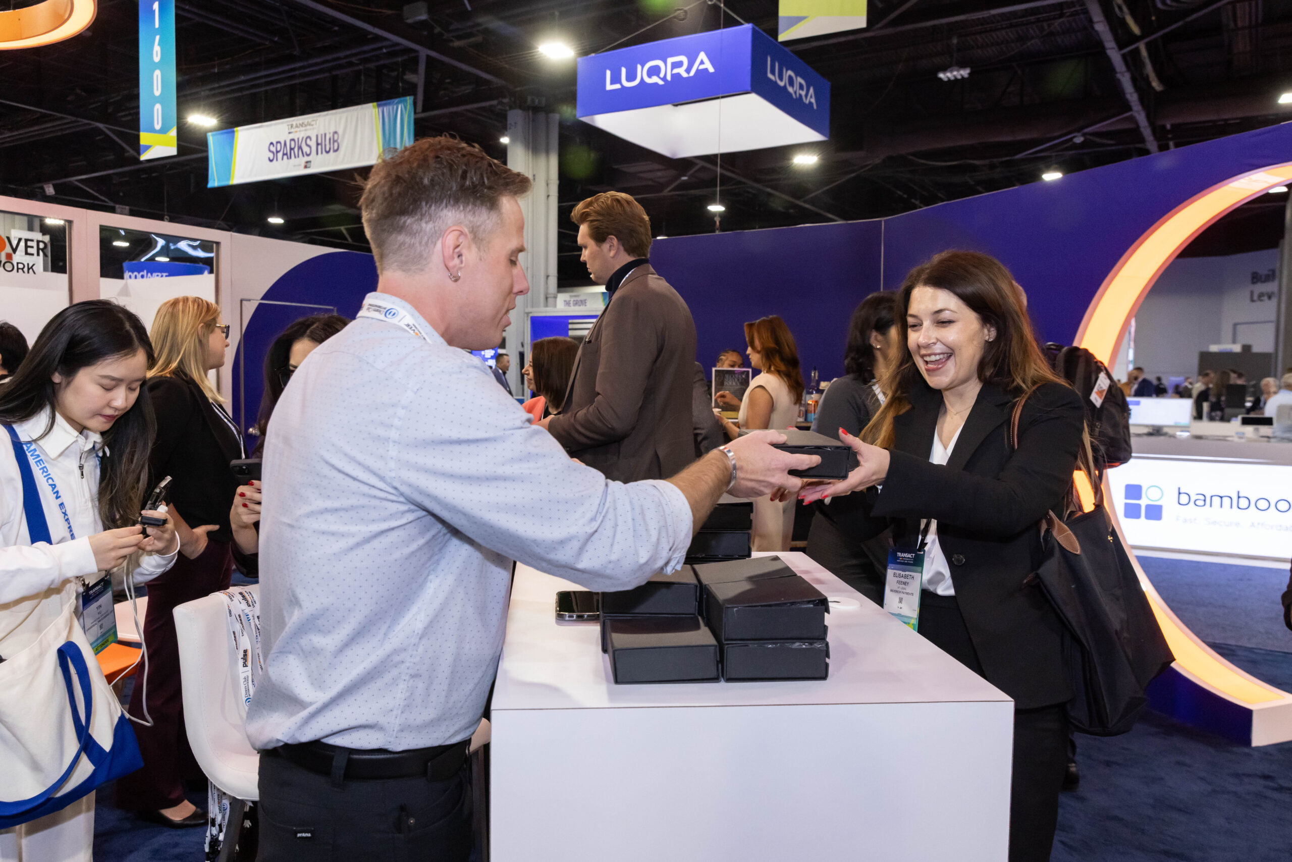 Exhibitor with an attendee