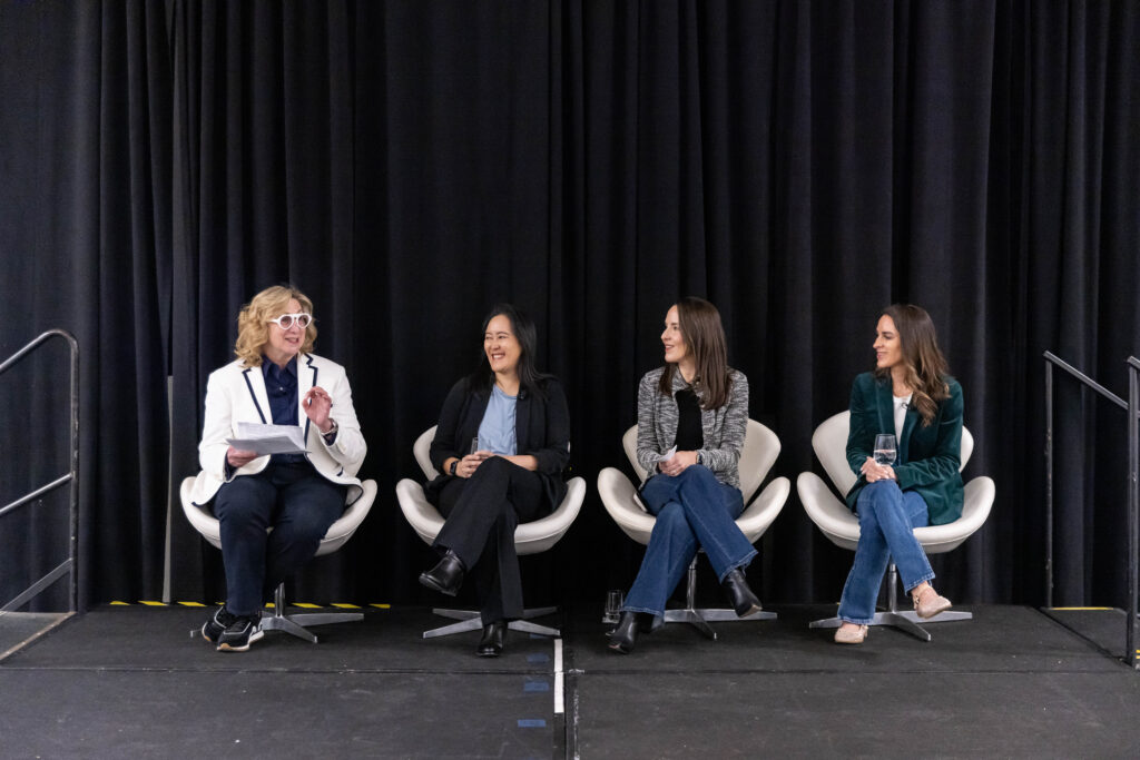 Speakers on stage at EMPOWHER